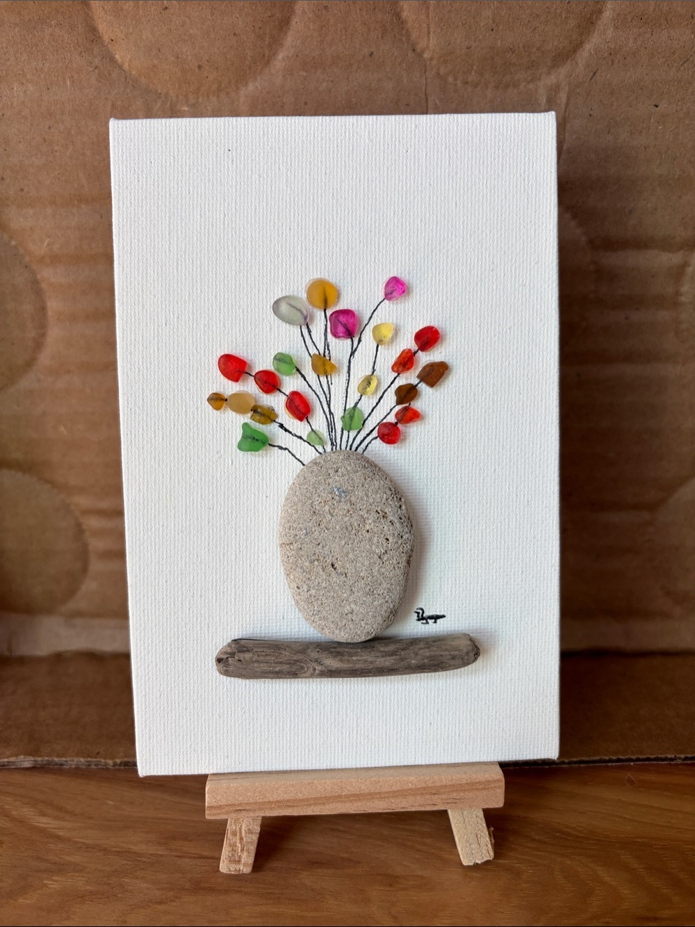 Pebble Vase Mixed-Media Wall Art with Colorful Sea Glass Blooms